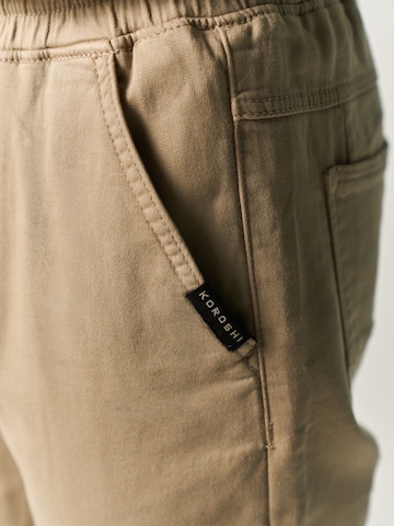 Tapered Pantaloni di KOROSHI in beige
