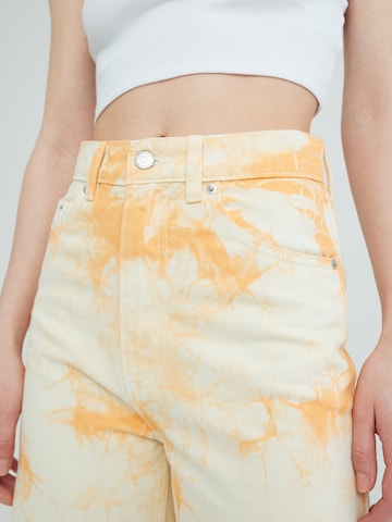 EDITED Wide leg Jeans 'Avery' in Yellow