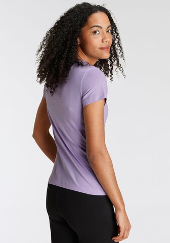 PUMA - Camiseta funcional 'Essential' en lila