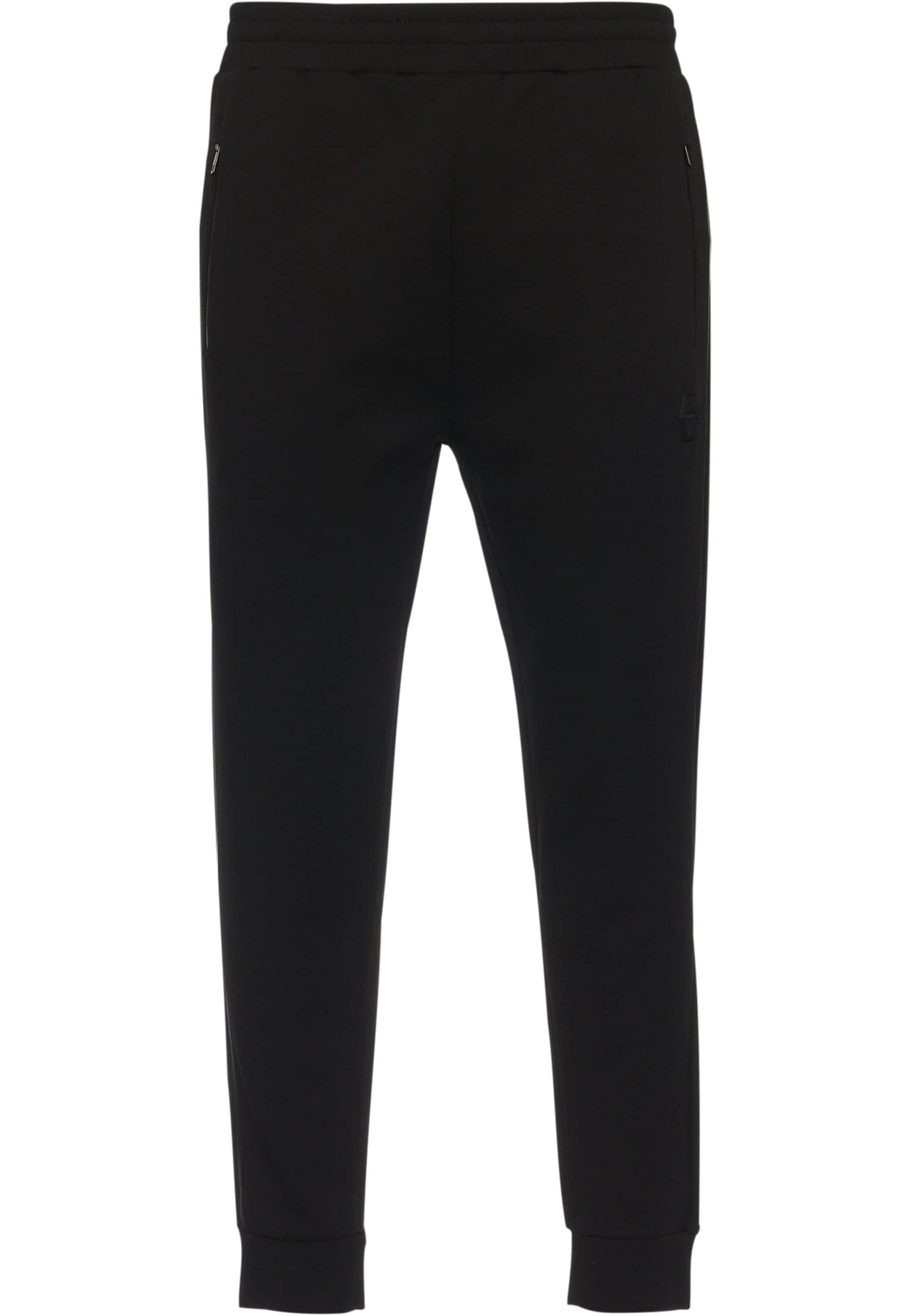 SOUTHPOLE Tapered Trousers in Black: front