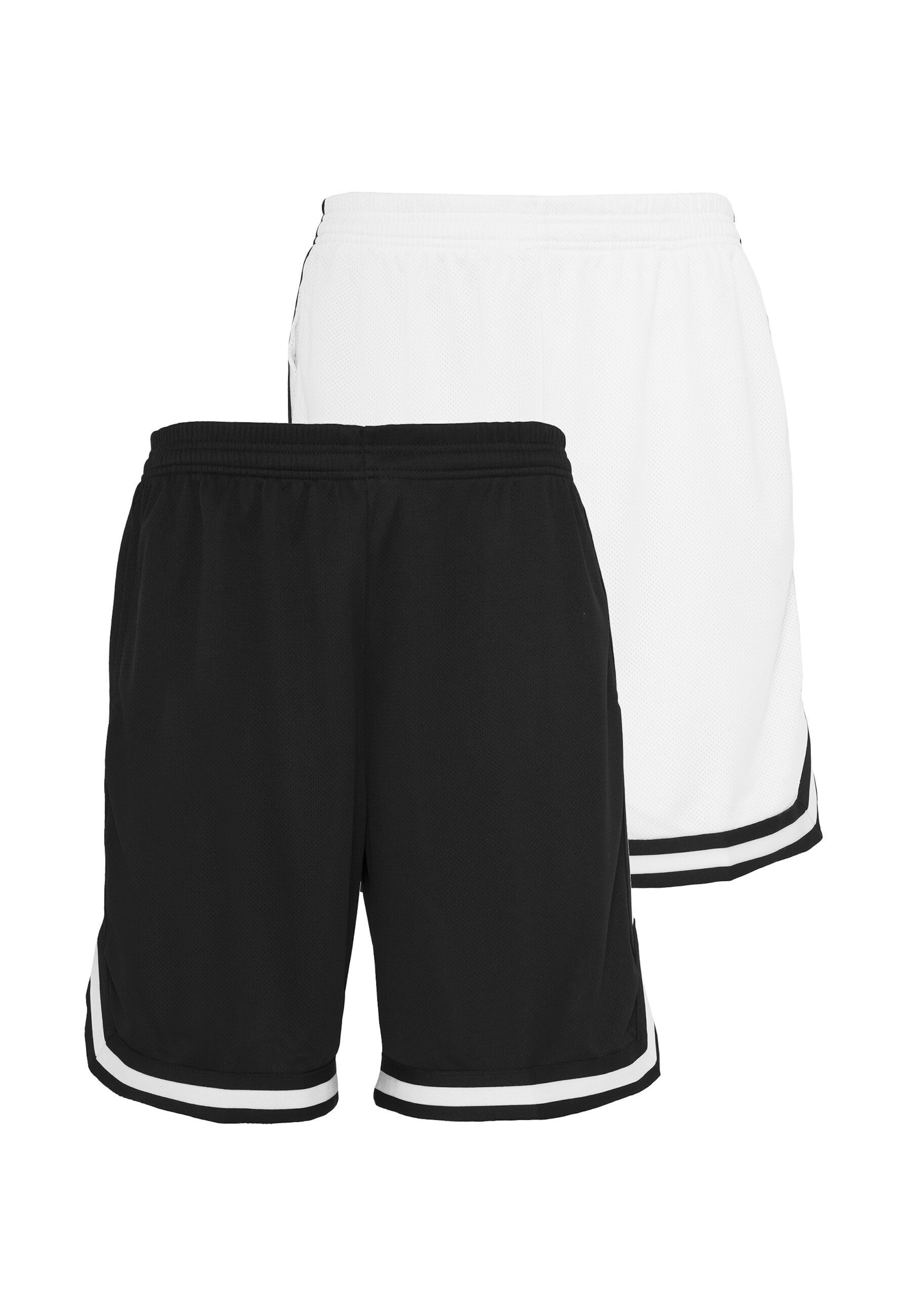 Urban Classics Loose fit Trousers in Black: front