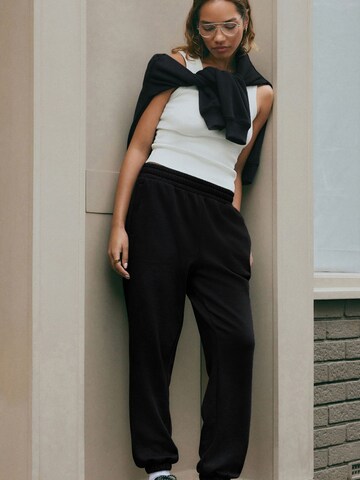 Next - Tapered Pantalón en negro