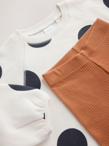 Set Next en beige