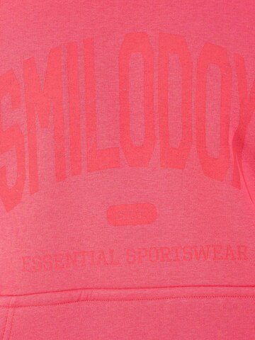 Veste de survêtement Smilodox en rose