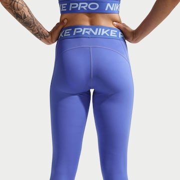 Nike Sportswear Skinny Workout Pants in Purple