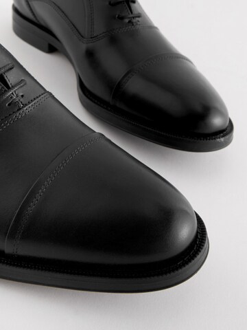 Next - Zapatos con cordón en negro
