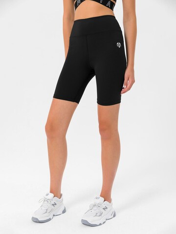 Skinny Pantaloni sportivi di MOROTAI in nero