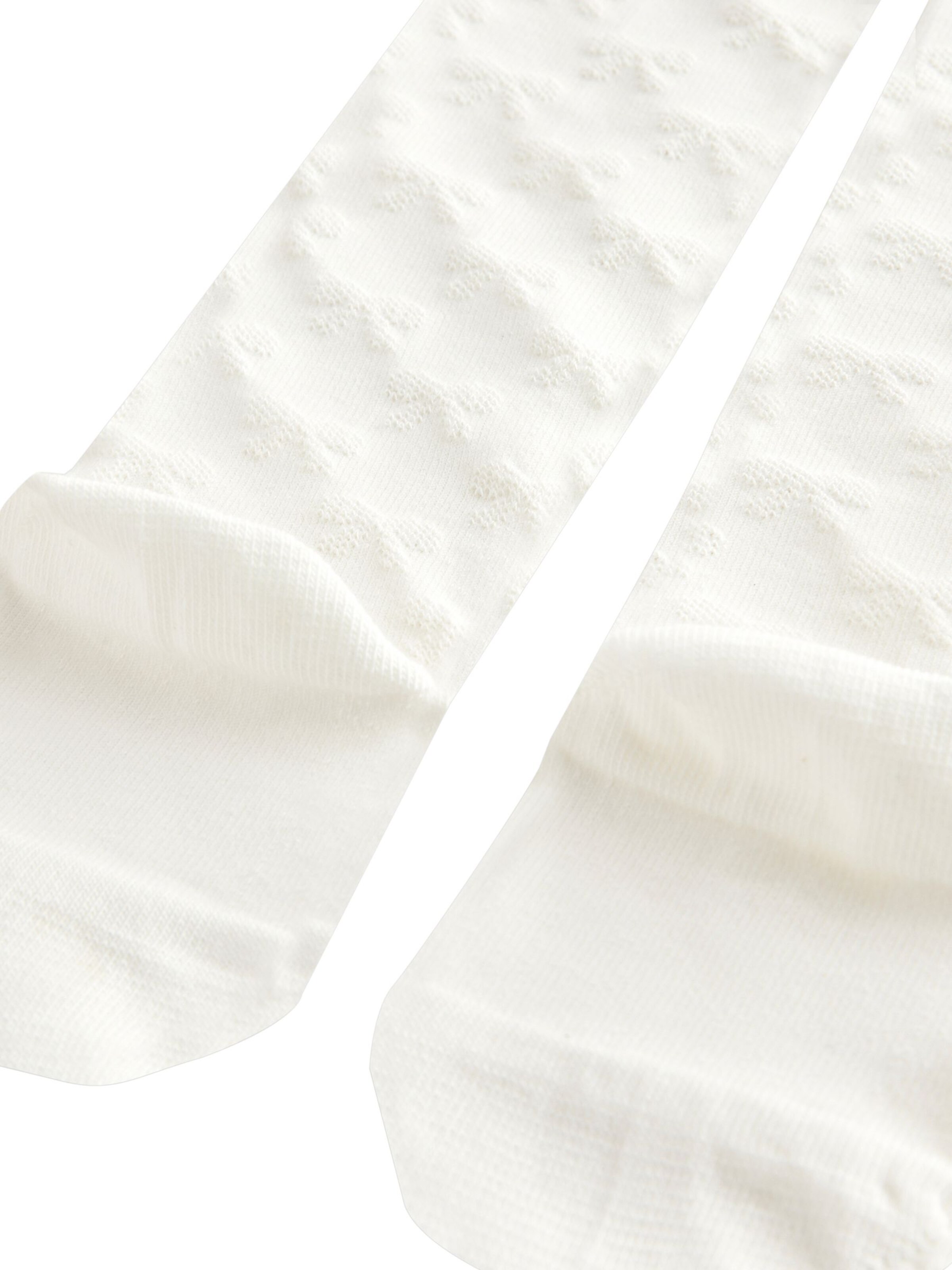 Collant Next en blanc