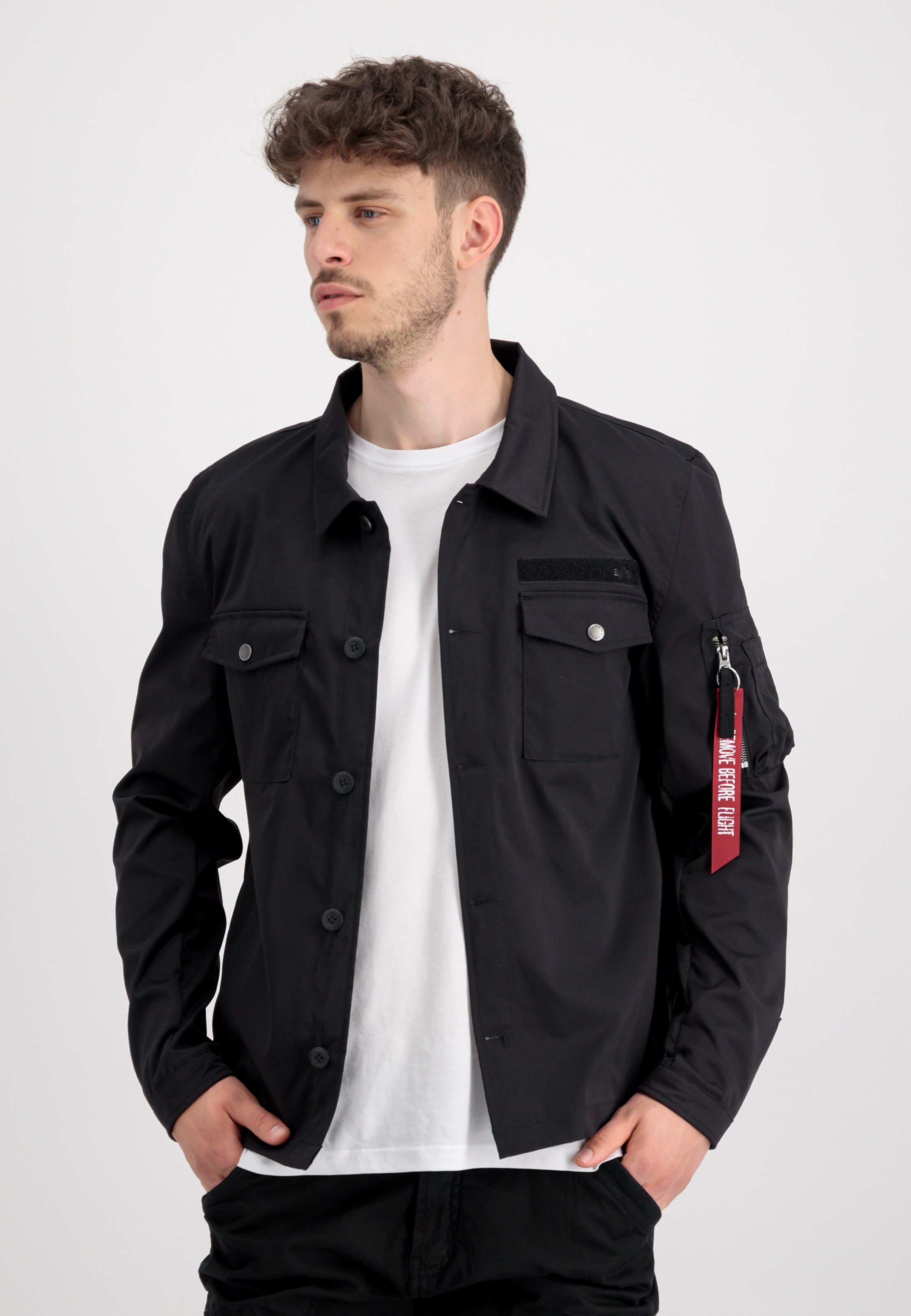 ALPHA INDUSTRIES Slim fit Between season jacket in Black ABOUT YOU