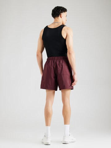 Nike Sportswear Loosefit Shorts 'CLUB' in Rot