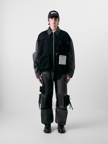 KARL LAGERFELD JEANS Prehodna jakna 'ATELIER' | črna barva