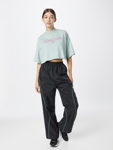 Wide leg Pantaloni de la Reebok pe negru