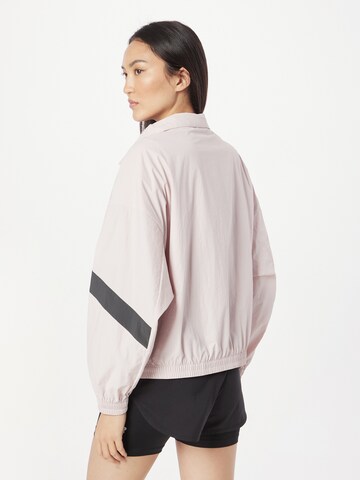 Veste mi-saison 'Athletics' new balance en rose