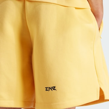 ADIDAS SPORTSWEAR Loose fit Workout Pants 'Z.N.E. Premium' in Yellow