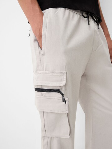 Bershka Tapered Cargo trousers in Grey