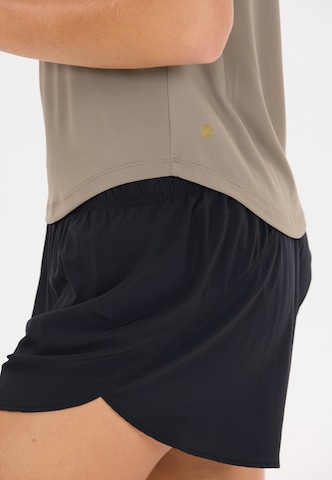 Athlecia Performance shirt 'Doja' in Brown