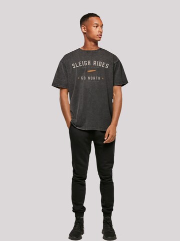 T-Shirt 'Schlittenfahren Weihnachten Christmas' F4NT4STIC en noir