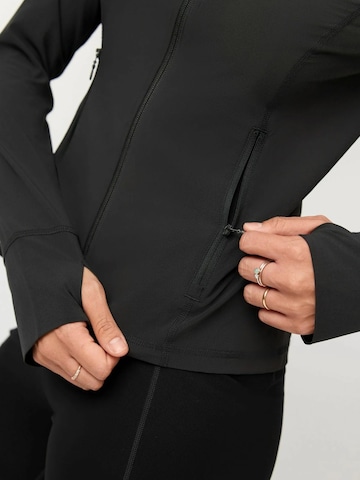 Girlfriend Collective Urheilutakki ' Estrella ' värissä musta