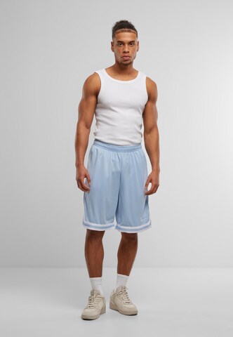 Regular Pantalon 'Small Signature' Karl Kani en bleu