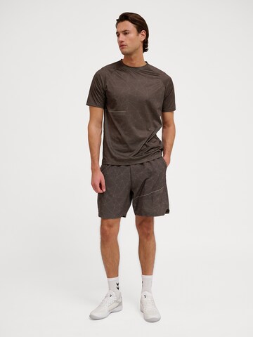 Regular Pantalon de sport 'Court' Hummel en marron