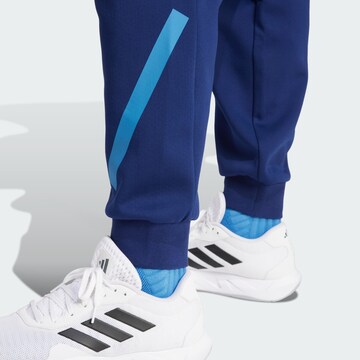 ADIDAS PERFORMANCE Tapered Sporthose 'France Travel Z.N.E.' in Blau