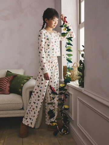 Next Pyžamo – béžová: přední strana