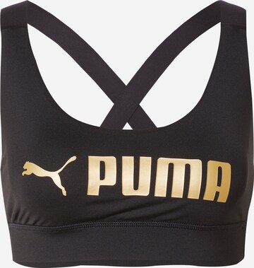 Reggiseno sportivo di PUMA in nero: frontale