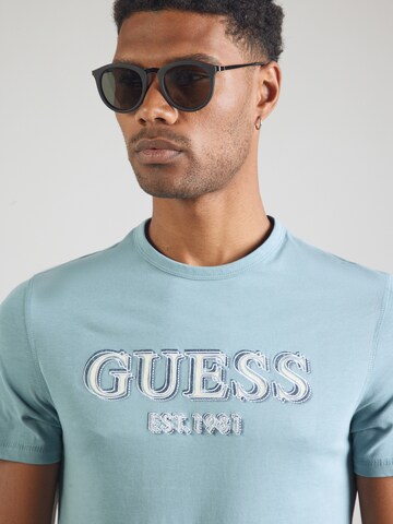 GUESS Bluser & t-shirts i blå