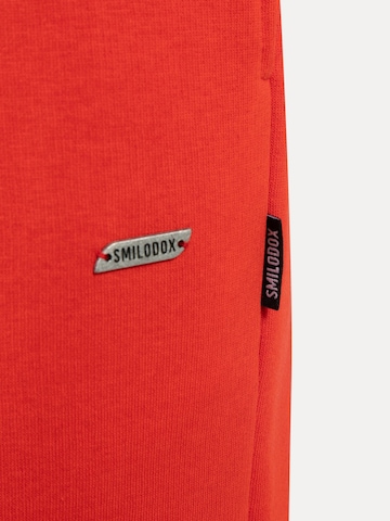Effilé Pantalon Smilodox en orange