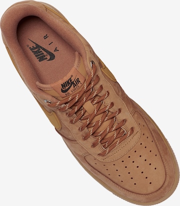 Nike Sportswear Platform trainers in Brown