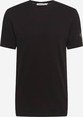 T-Shirt Calvin Klein Jeans en noir : devant