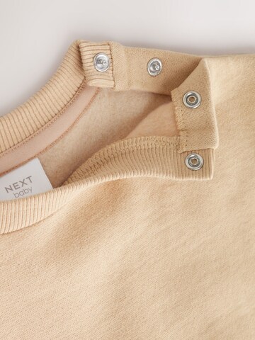 Set Next en beige
