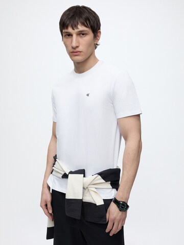 Calvin Klein Jeans Tričko 'CLASSIC' - Modrá