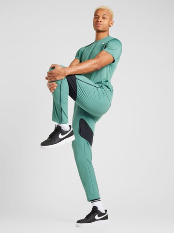 Maglia funzionale di NIKE in verde
