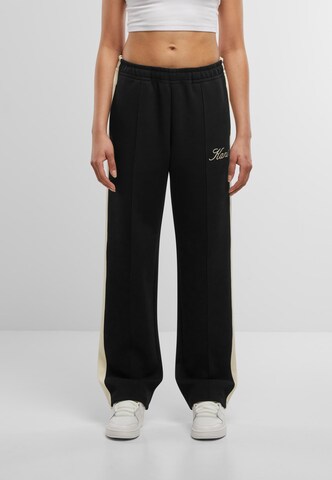 Loosefit Pantaloni con piega frontale di Karl Kani in nero