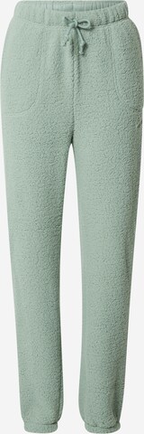 NIKE Workout Pants in Green: front