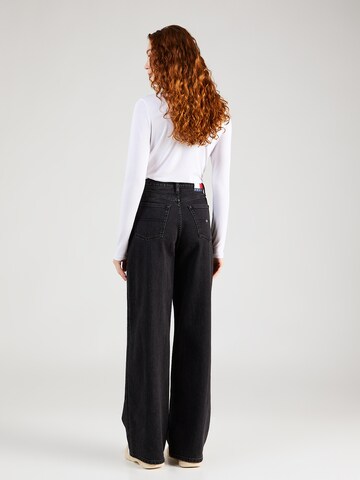 juoda Tommy Jeans Plačios klešnės Džinsai 'CLAIRE WIDE LEG'
