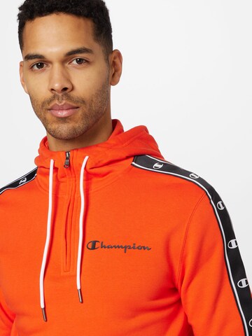 Champion Authentic Athletic Apparel Sweatshirt in Orange