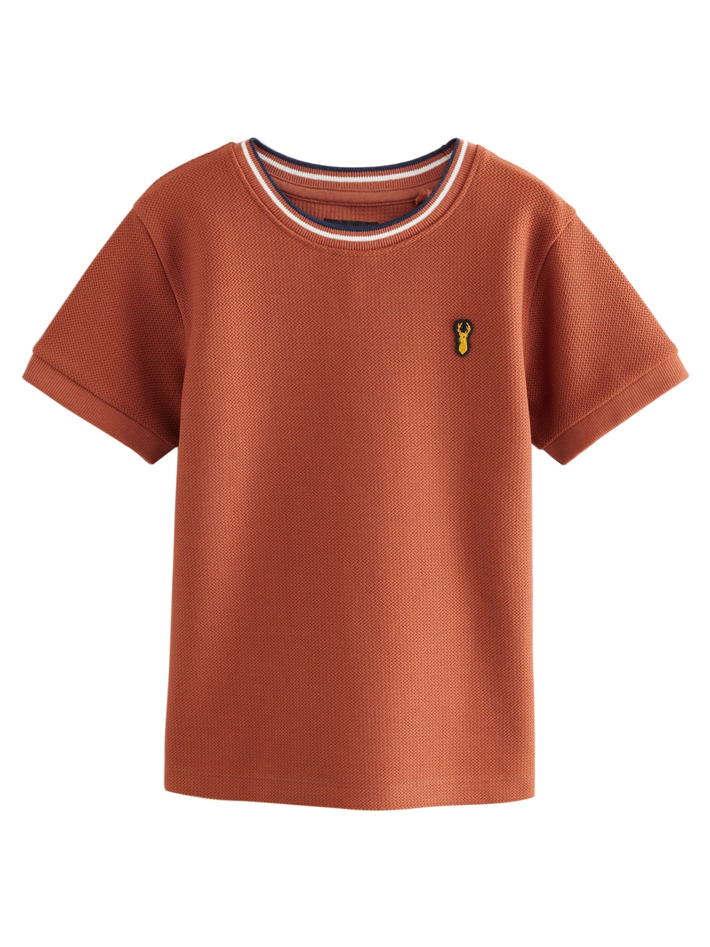 Next T-shirt i brun: framsida