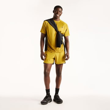 new balance - Loosefit Pantalón deportivo 'RC Essential 5' en amarillo