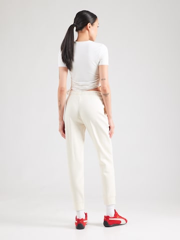 Effilé Pantalon de sport 'Ess Elevated' PUMA en beige