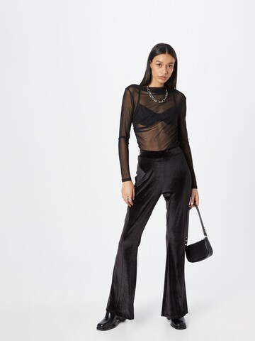 Nasty Gal Rozkloszowany krój Spodnie w kolorze czarny