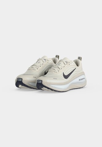 NIKE Обувь для бега 'Vomero Plus' в Серый: спереди