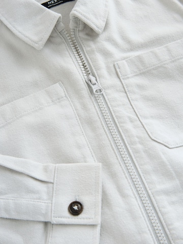 Next Övergångsjacka i grå