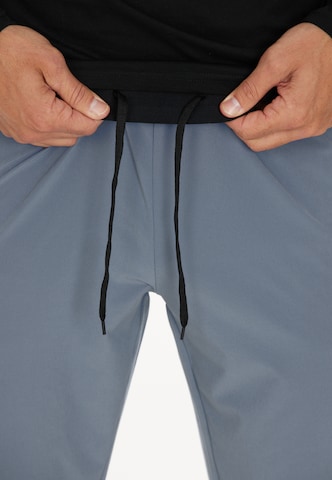 Virtus Tapered Workout Pants 'Blag' in Blue