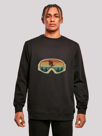 Sweat-shirt 'Retro Skibrille Wintersport' F4NT4STIC en noir : devant