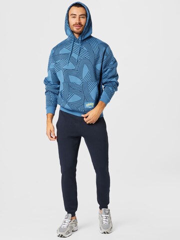 ADIDAS ORIGINALS Sweatshirt 'Original Athletic Club Allover Print' in Blau