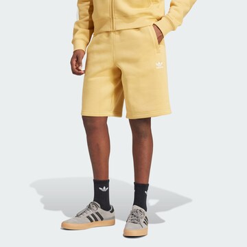 ADIDAS ORIGINALS - Regular Calças 'Trefoil Essentials' em amarelo: frente