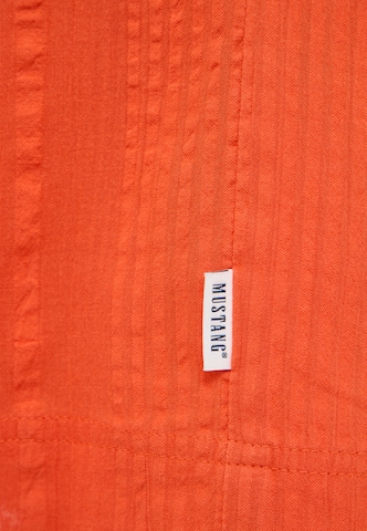 MUSTANG Loose fit Trousers in Orange