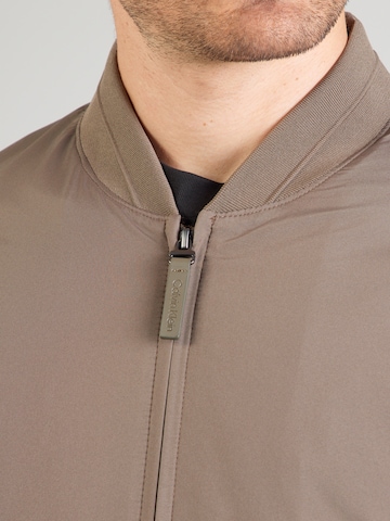 ruda Calvin Klein Demisezoninė striukė 'HERO'